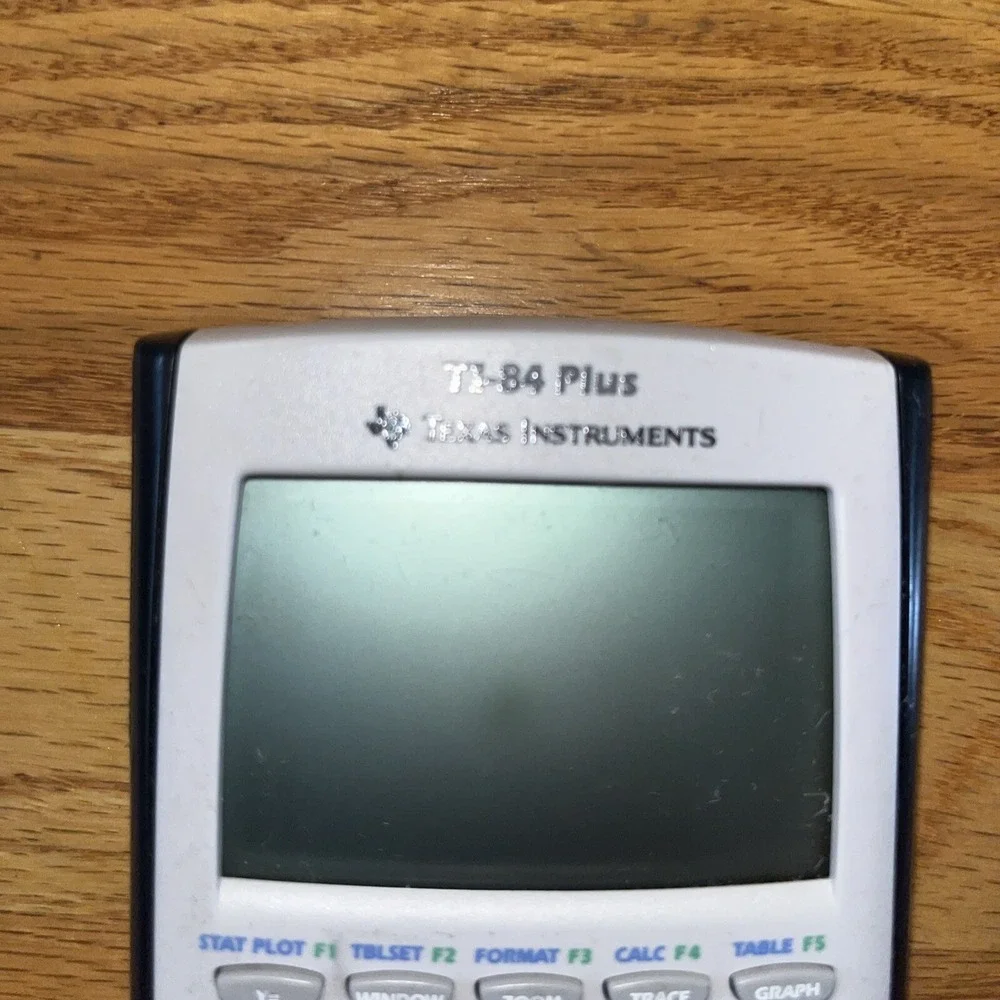 Texas Instruments TI 84 Plus Black Graphing Calculator with Cover